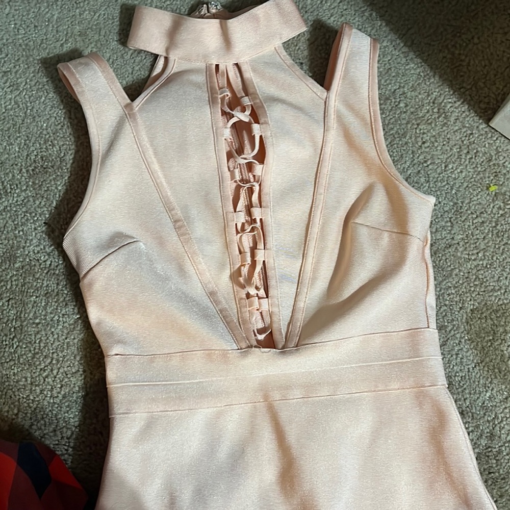 B-Sharp size small pink dress. Mid length and form fitting.